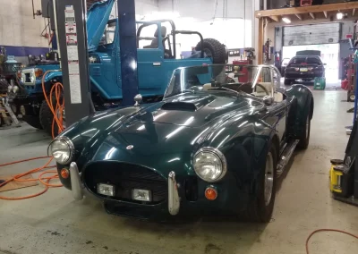 Classic Green Sports Car in the shop 1